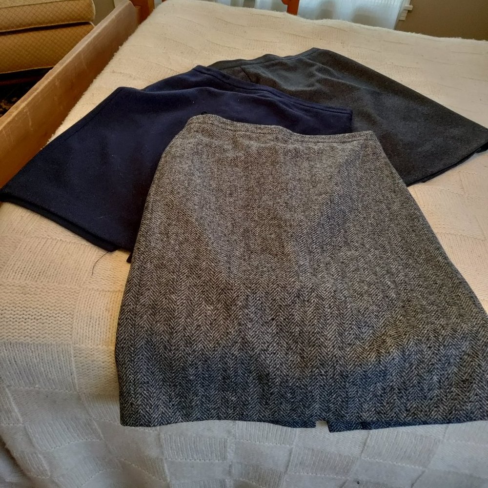 Three woolen, hardly worn pencil skirts